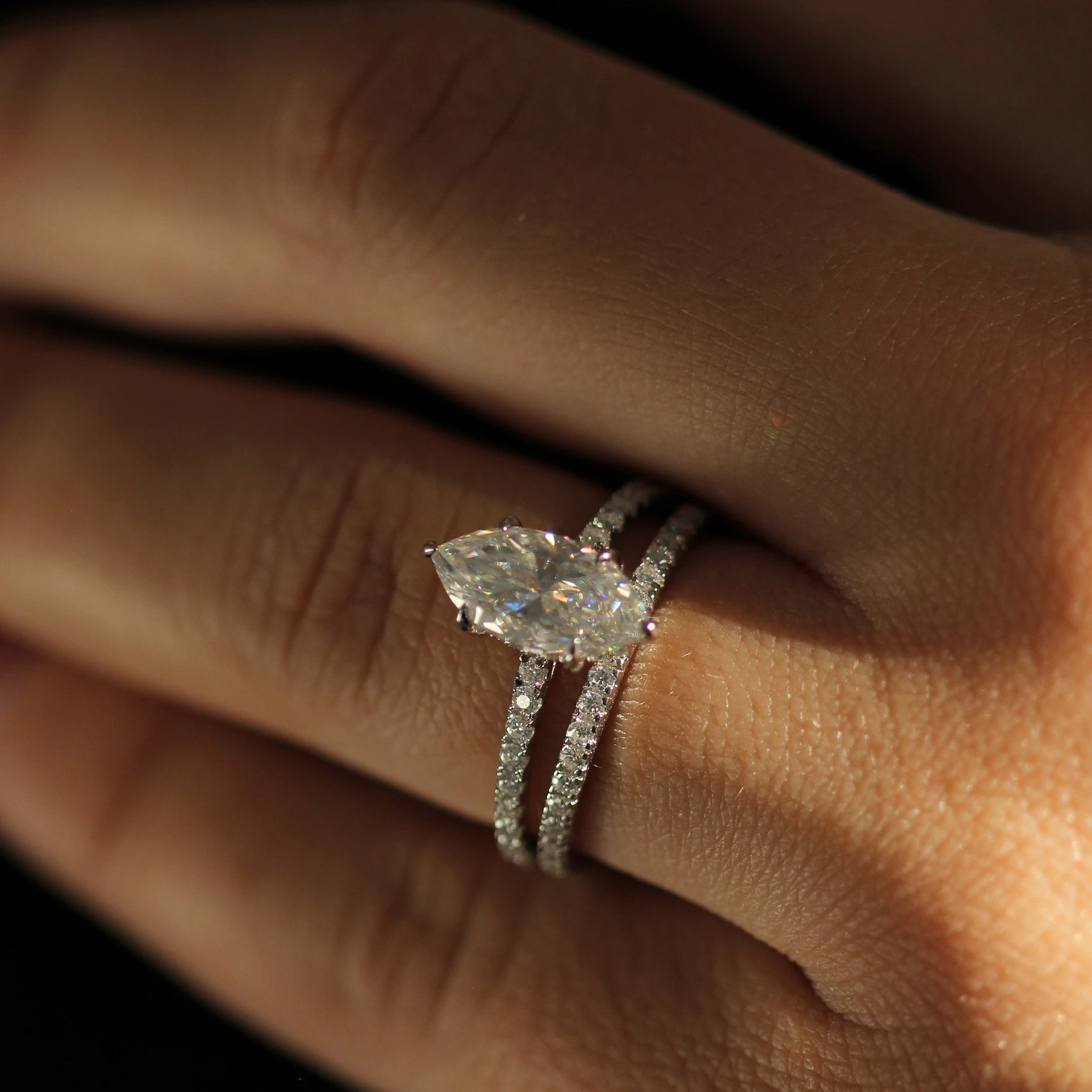 2 carat marquise moissanite ring in silver with hidden halo and pave band