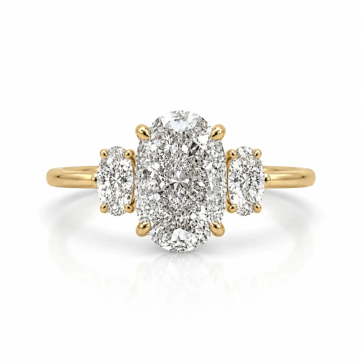 three stone oval trilogy ring in 14k gold plating