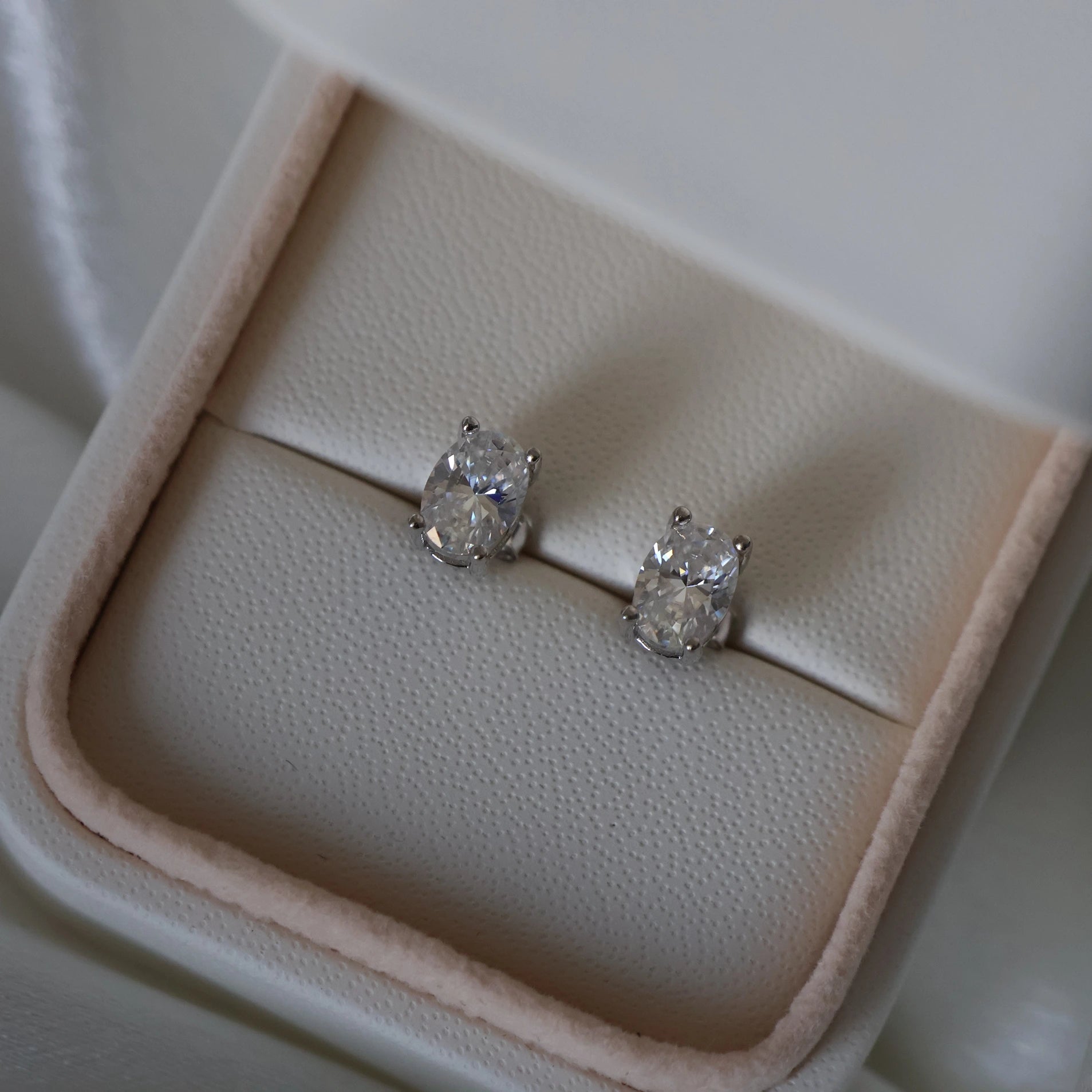 Oval moissanite stud earrings 2 TCW in silver