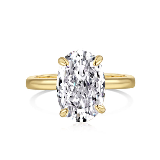 Oval 18k gold vermeil ring on white background