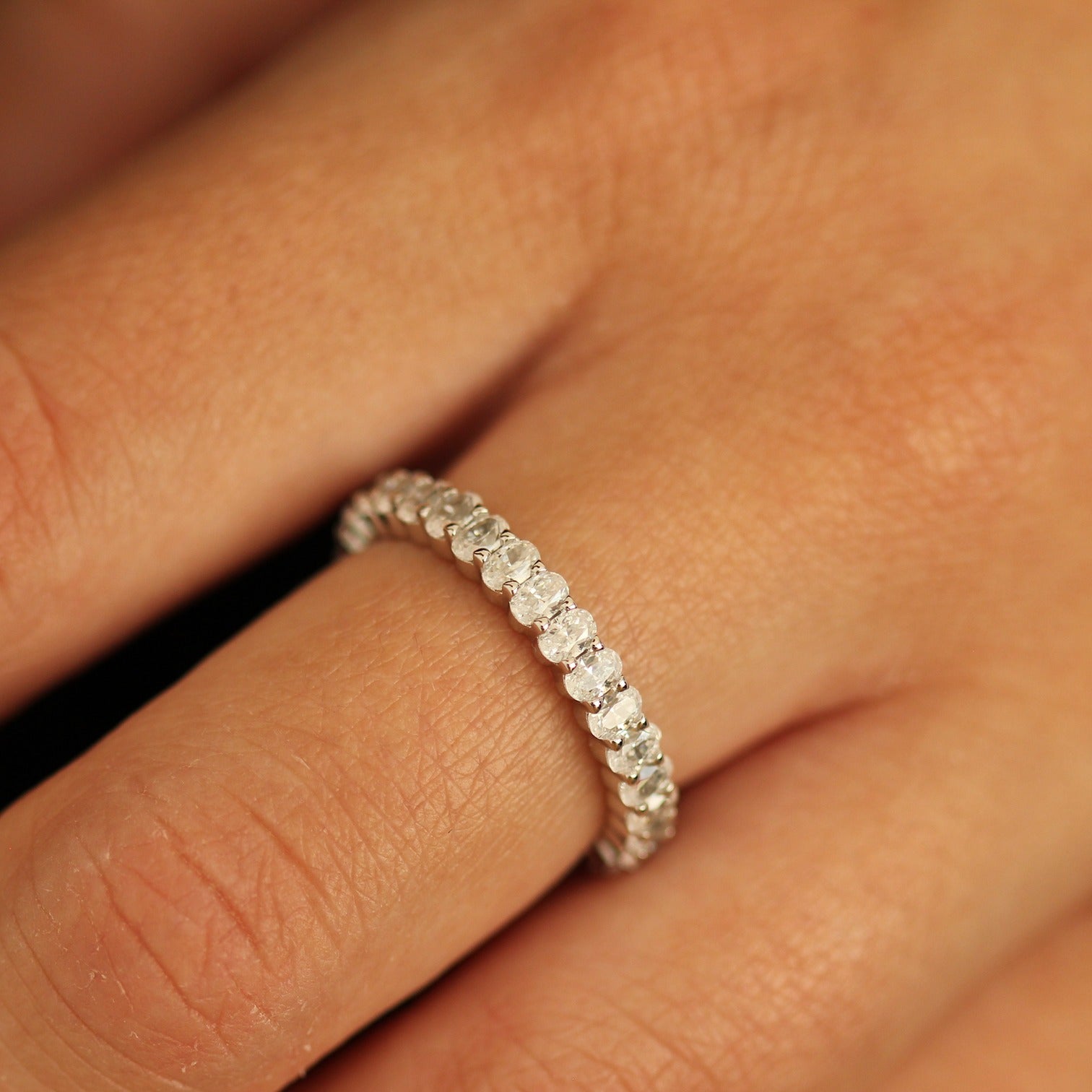 cubic zirconia oval eternity band on hand