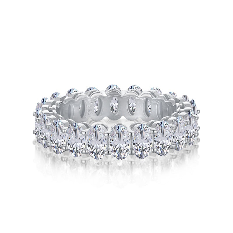 silver oval eternity ring on white background