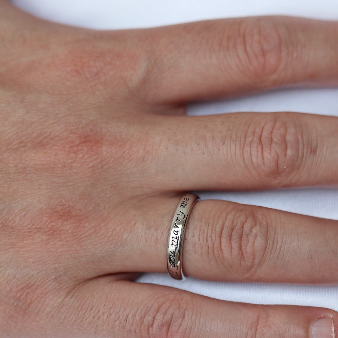 will you marry me proposal ring on male model