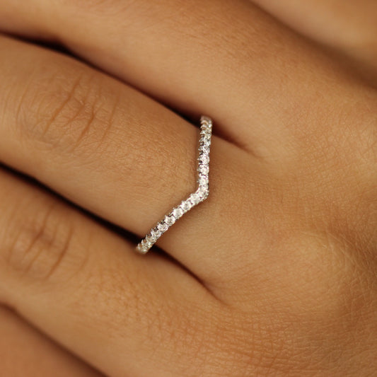 silver wishbone ring on hand