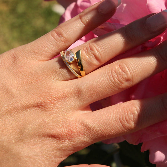 Model wearing gold oval wrap band 1 carat oval stone
